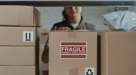 A returned parcel being inspected at the returns bench