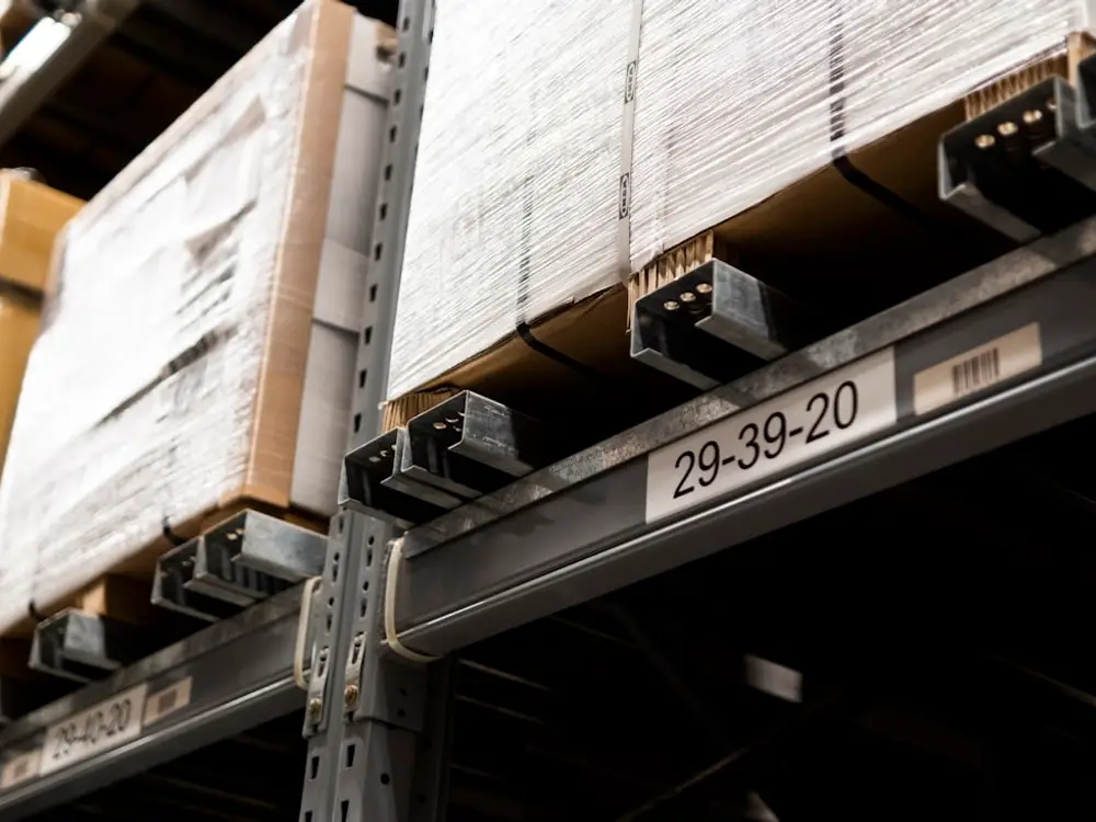Racking beam with a printed location label and barcode